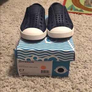 Navy blue Natives size 7c